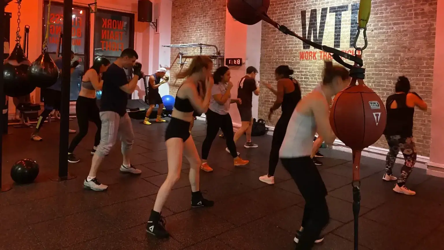 Work Train Fight trainers conducting boxing training session